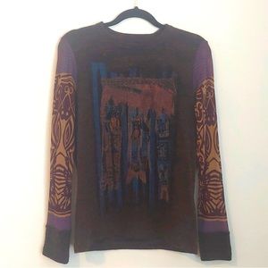 Save the Queen copper sweater.  The size is large and fits medium also for women